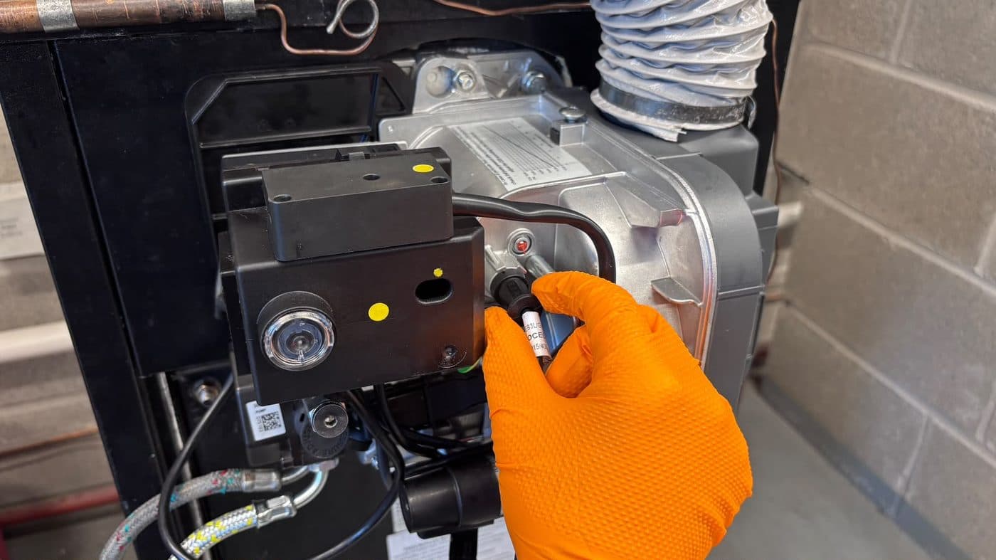 Step 2: Locate and remove the photocell probe in the burner housing.