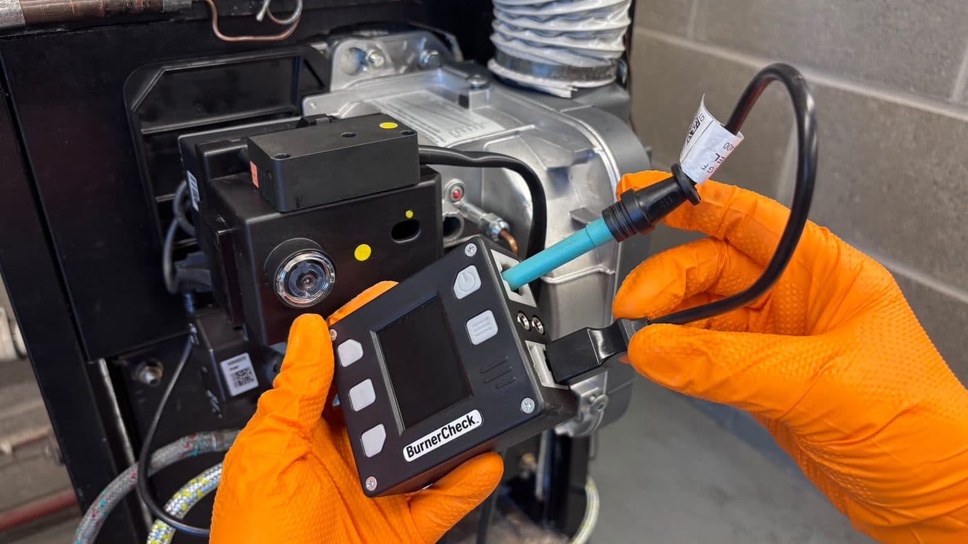 Step 5: Plug the photocell connector into the lower left Elco test port on the BurnerCheck.