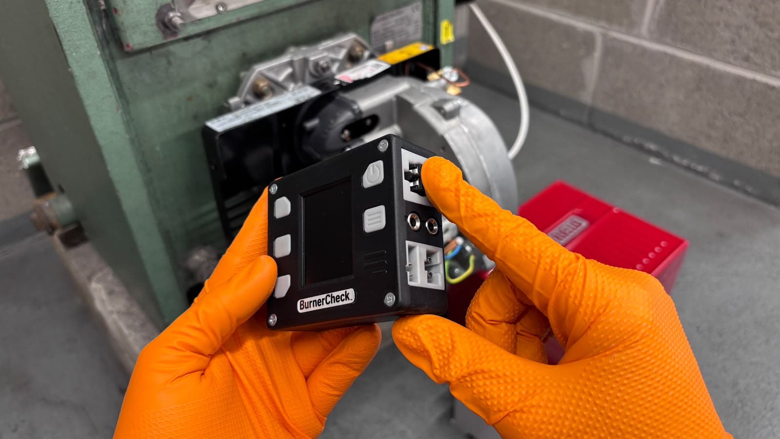 Step 5: Plug the photocell connector into the Riello test port on the BurnerCheck, until the connector pins make contact.