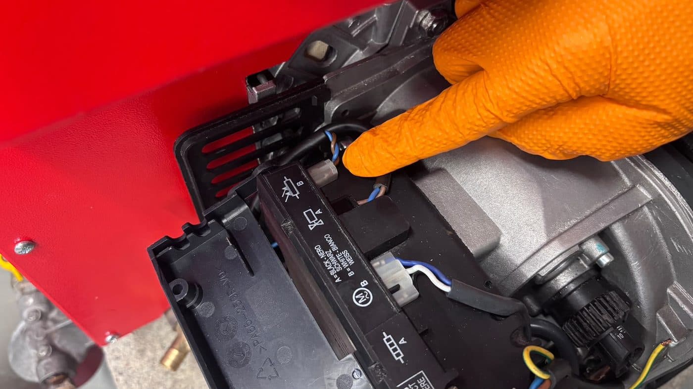 Step 3: Unplug the photocell connector — it's the final slot with a B above it.