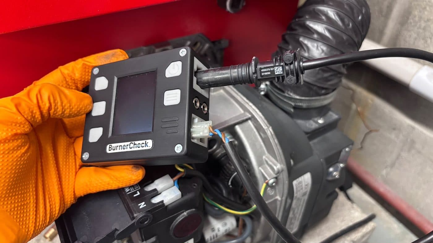 Step 5: Plug the photocell connector into the upper left Riello test port.